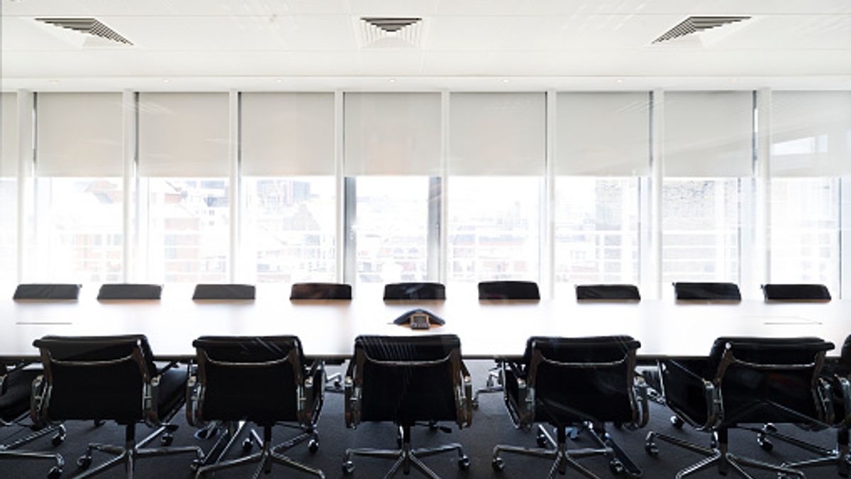 Empty boardroom meeting space in office