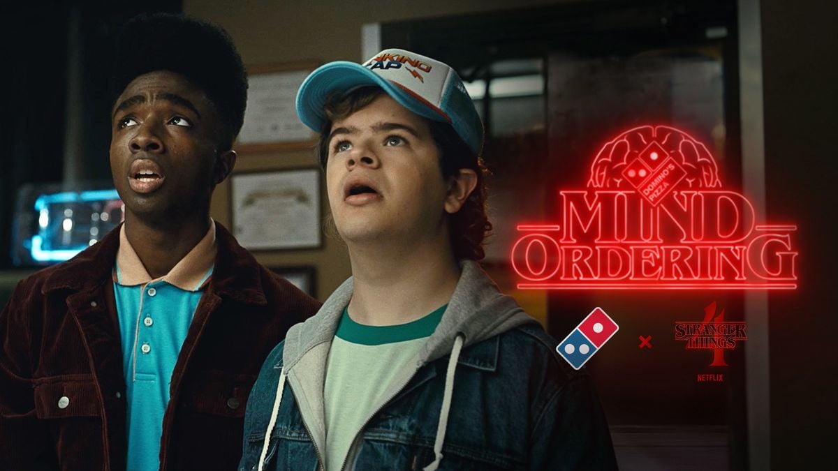 Two characters from Stranger Things as part of a Domino's partnership